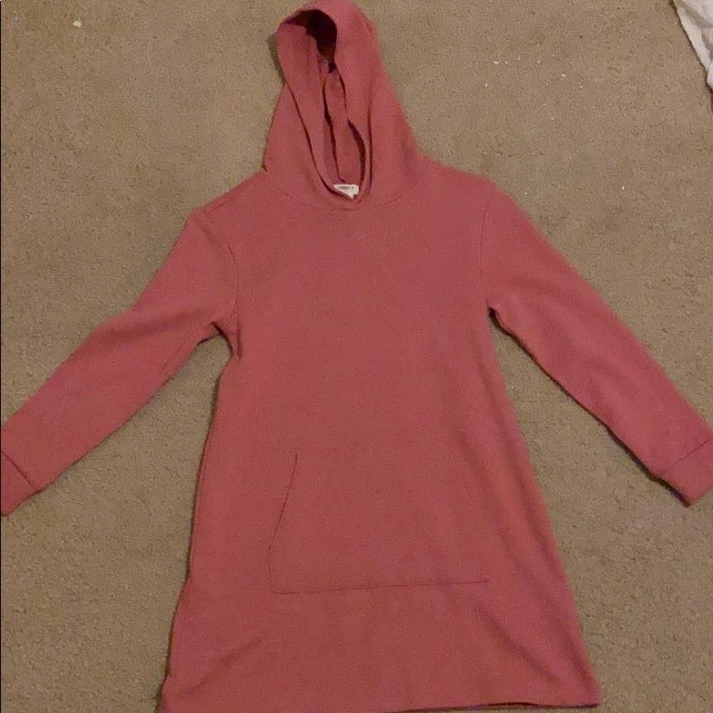 A pink sweater dress that perfect for the winter.